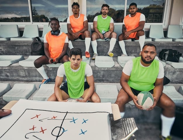 A team huddle where the coach is explaining the game plan and strategies to the Kabaddi players. The players are listening attentively, and the coach is using gestures to emphasize key points.