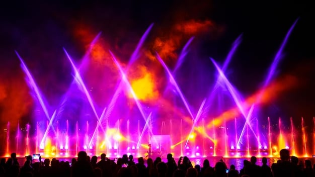 A concert stage with a band performing live, with a large crowd cheering and waving their hands. The lighting should be dynamic and colorful, capturing the excitement of a live music event.