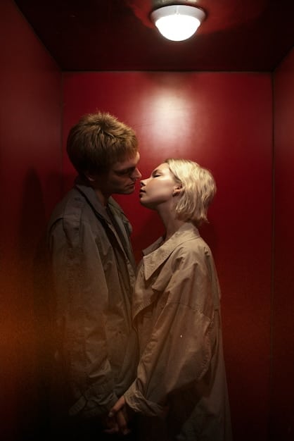 A still from a romantic movie showing the two main characters sharing a tender moment. The scene captures their emotional connection and chemistry.