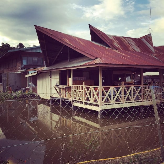 Newly constructed houses for flood victims in Bangladesh, symbolizing the long-term rehabilitation efforts to restore their lives.